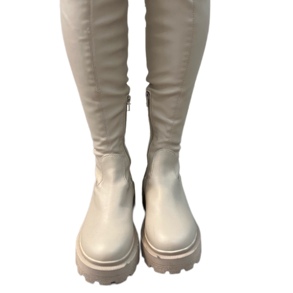 Knee high lug cream boots. FASHIONISTAS only!